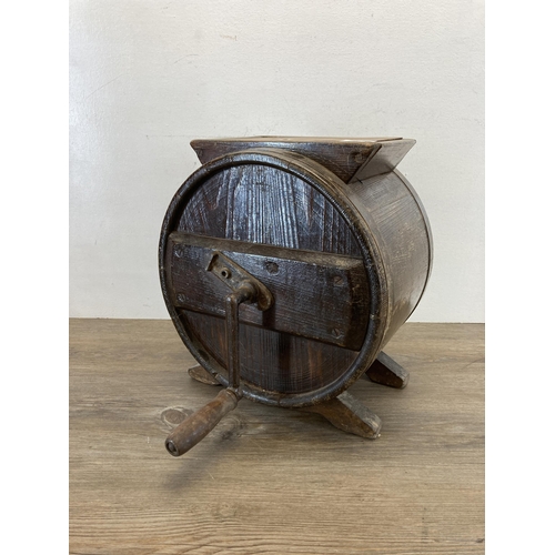 555 - A 19th century oak table top butter churn - approx. 38cm high