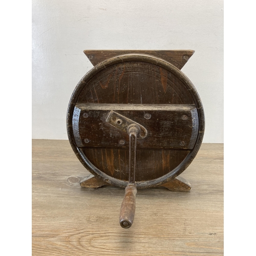 555 - A 19th century oak table top butter churn - approx. 38cm high