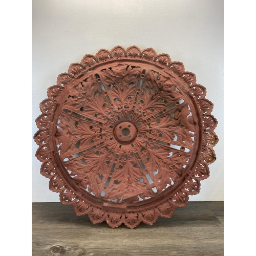 557 - A Victorian cast iron ceiling rose - approx. 76cm diameter