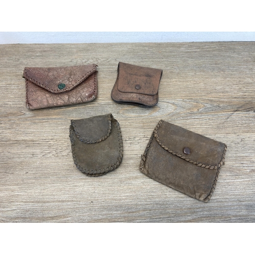 558 - A collection of items to include early 20th century brown leather Hockley Abbey of England tape meas... 