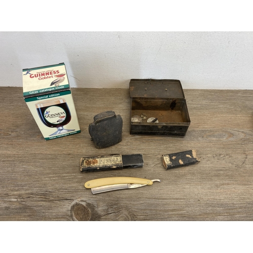 558 - A collection of items to include early 20th century brown leather Hockley Abbey of England tape meas... 