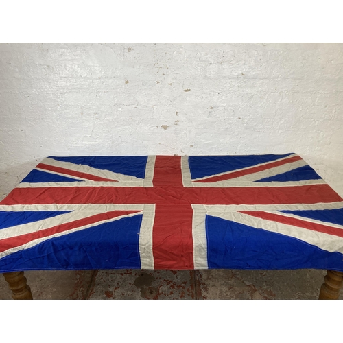 561 - A large WWII era Union Jack flag - approx. 230cm long x 105cm wide