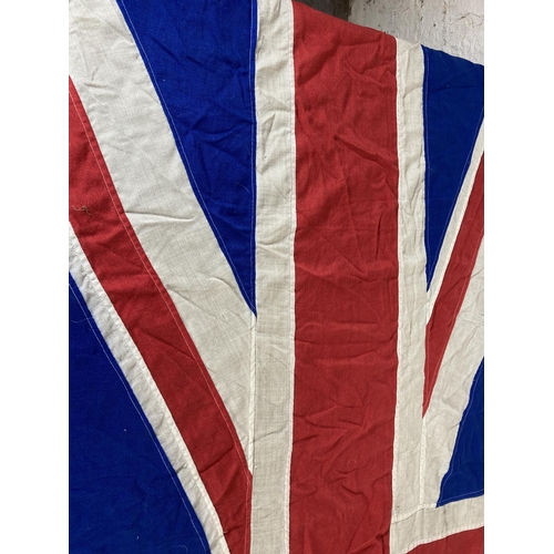 561 - A large WWII era Union Jack flag - approx. 230cm long x 105cm wide