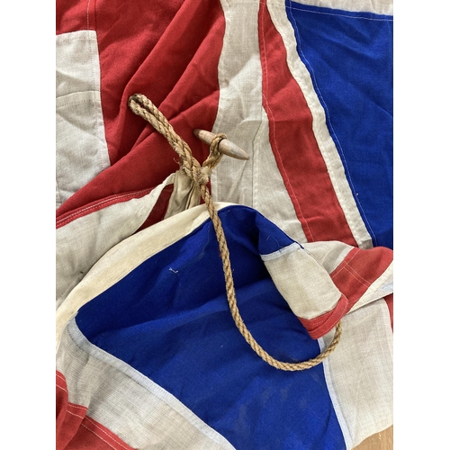 561 - A large WWII era Union Jack flag - approx. 230cm long x 105cm wide