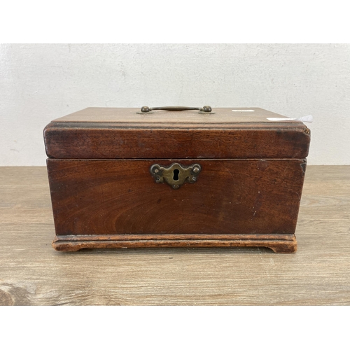 563 - A Georgian mahogany three section tea caddy - approx. 12cm high x 22.5cm wide x 13.5cm deep