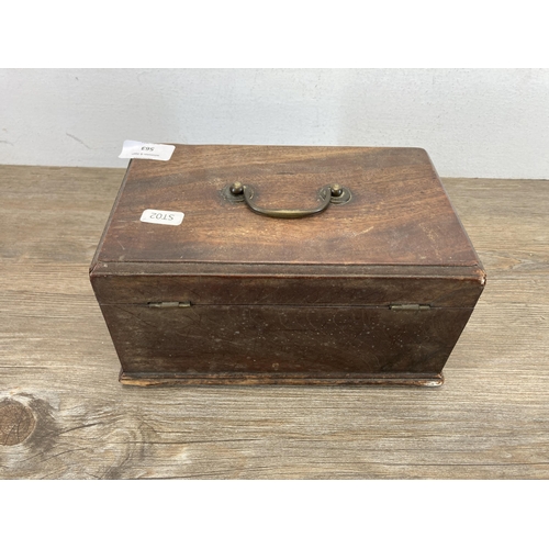 563 - A Georgian mahogany three section tea caddy - approx. 12cm high x 22.5cm wide x 13.5cm deep