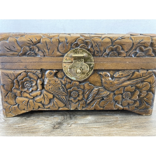 564 - A vintage Chinese carved hardwood jewellery box with bird and foliate design - approx. 12cm high x 2... 