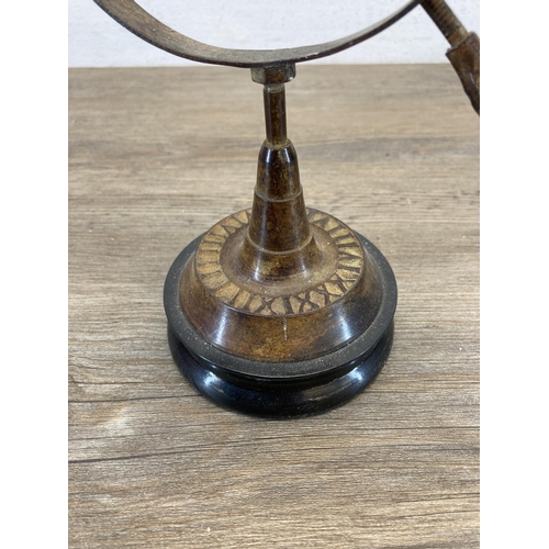 571 - An antique style patternated metal desktop armillary sphere - approx. 28.5cm high