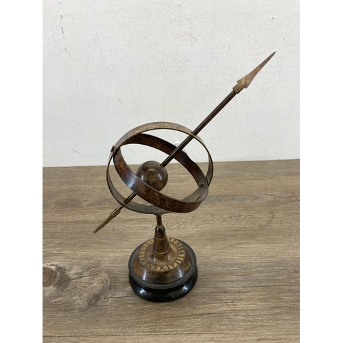 571 - An antique style patternated metal desktop armillary sphere - approx. 28.5cm high