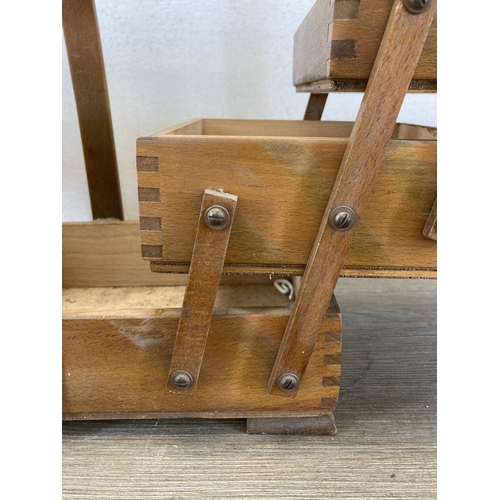 576 - A mid 20th century teak concertina sewing box