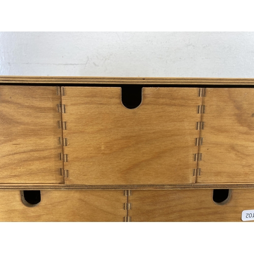 580 - A modern plywood six drawer table top cabinet - approx. 32cm high x 42cm wide x 19cm deep