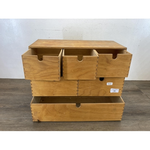 580 - A modern plywood six drawer table top cabinet - approx. 32cm high x 42cm wide x 19cm deep