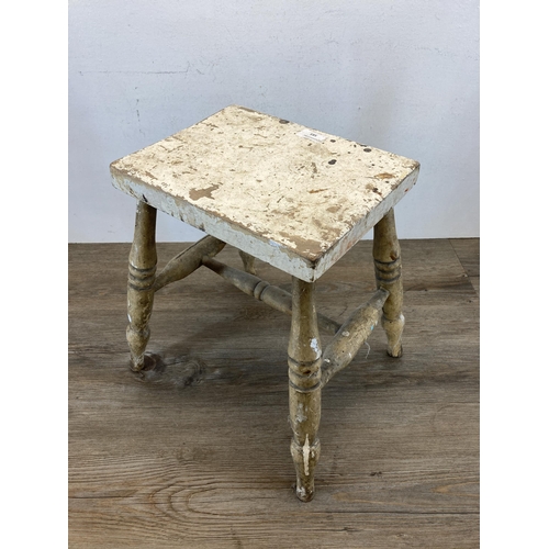 583 - A 19th century painted pine farmhouse stool - approx. 36cm high