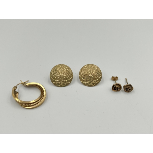 2414 - Five pieces of jewellery, one 9ct gold earring, two 9ct gold floral earrings and two yellow metal en... 