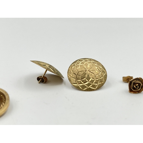 2414 - Five pieces of jewellery, one 9ct gold earring, two 9ct gold floral earrings and two yellow metal en... 