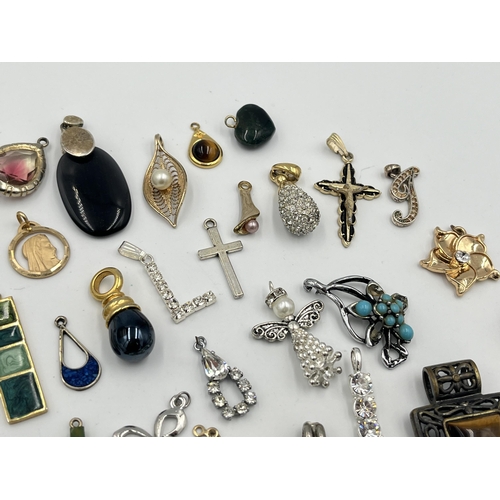 2426 - A collection of pendants