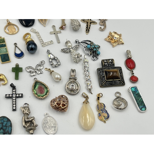 2426 - A collection of pendants