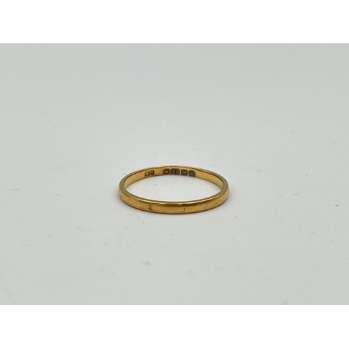 2477 - A hallmarked Birmingham 22ct gold wedding band, size L½ - approx. gross weight 1.4g