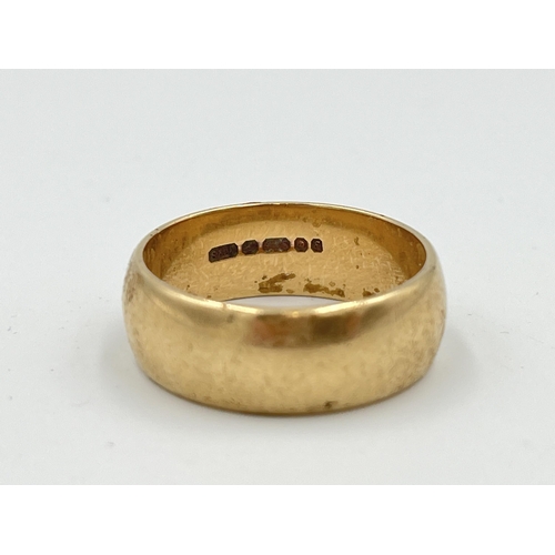 2478 - A hallmarked London 9ct gold wedding band, size S - approx. gross weight 7.3g