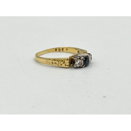 2479 - A hallmarked 18ct gold sapphire and diamond ring, size M½ - approx. gross weight 3.65g