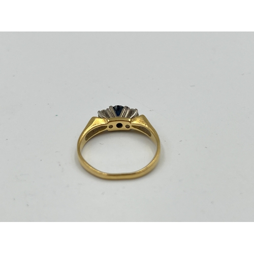 2479 - A hallmarked 18ct gold sapphire and diamond ring, size M½ - approx. gross weight 3.65g