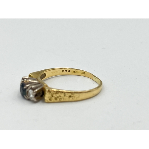 2479 - A hallmarked 18ct gold sapphire and diamond ring, size M½ - approx. gross weight 3.65g