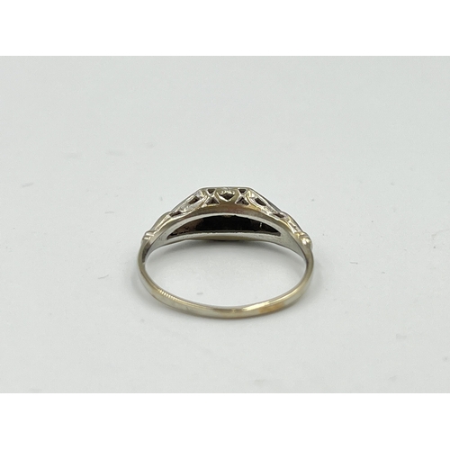 2494 - A 10ct white gold diamond ring, size M - approx. gross weight 2.13g