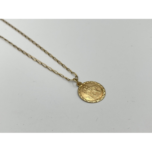 2496 - A 9ct gold St. Christopher pendant necklace - approx. gross weight 2.75g