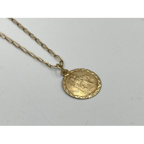 2496 - A 9ct gold St. Christopher pendant necklace - approx. gross weight 2.75g