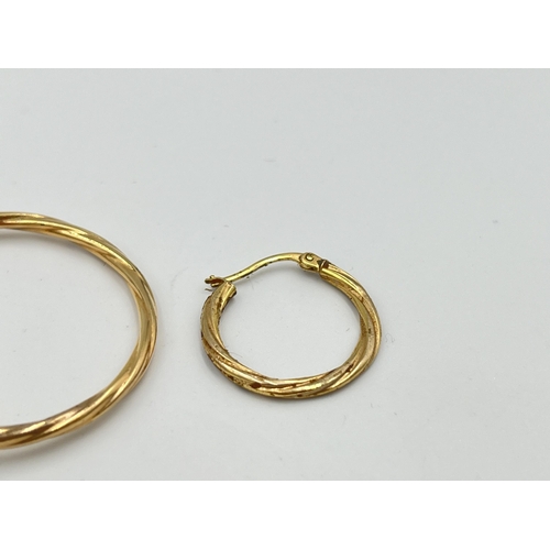 2498 - Three 9ct gold earrings - approx. gross weight 1.6g