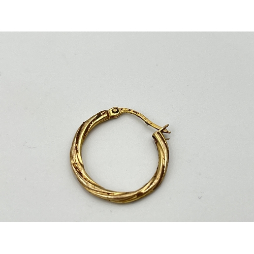 2498 - Three 9ct gold earrings - approx. gross weight 1.6g