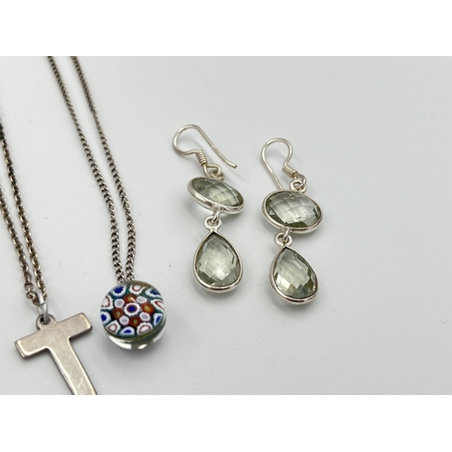 2499 - A collection of .925 silver jewellery to include brooches, millefiori pendant necklace, earrings etc... 