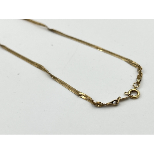 2507 - A hallmarked 9ct gold necklace for scrap - approx. gross weight 1.8g