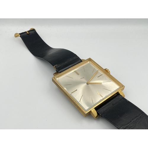 2333A - A vintage ImHof wall clock in the form of a wristwatch with swiss movement, numbered 1450762