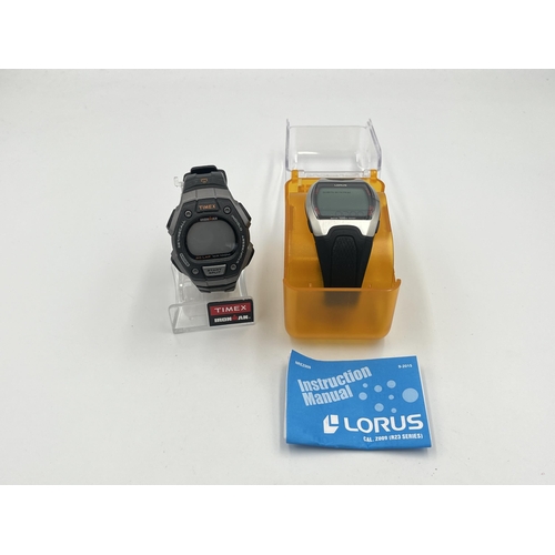 2336 - Two digital wristwatches, one boxed Lorus and one Timex Ironman with display stand