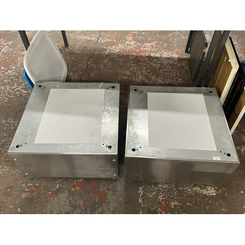 1052 - Two brushed steel stands