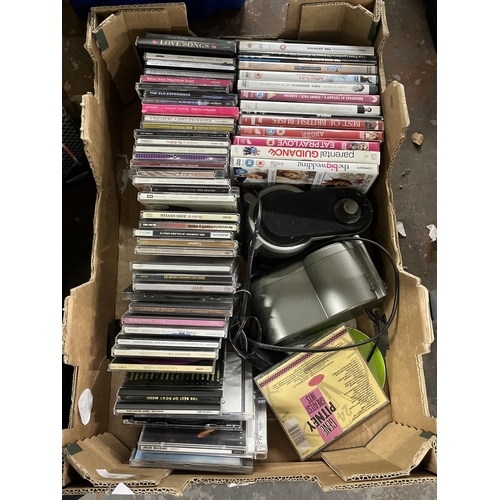 1055 - A collection of items to include four green metal jerry cans, JVC stereo system, CDs etc.