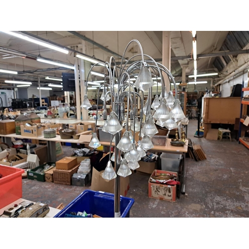 1011 - Seven various lamps to include Oriental porcelain Anglepoise style etc.