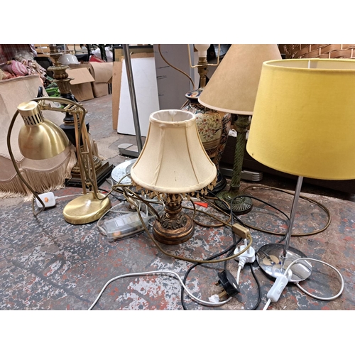 1011 - Seven various lamps to include Oriental porcelain Anglepoise style etc.