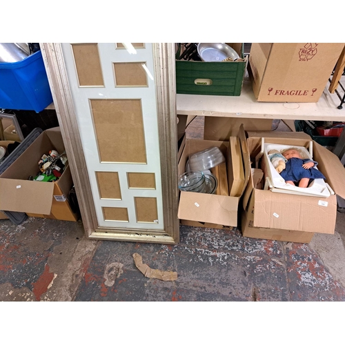 1026 - Four boxes containing books, kitchenware, key rings, large photo frame etc.