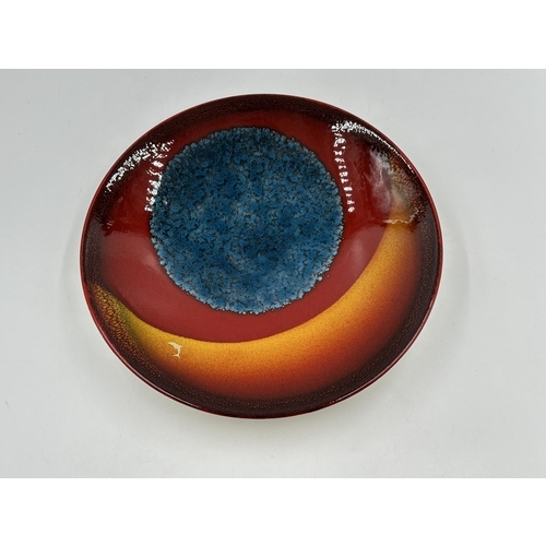 336 - A Poole Pottery The Planet Uranus limited edition charger - approx. 26.5cm diameter