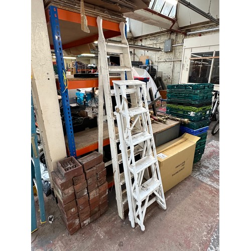 880 - Two sets of vintage white painted wooden step ladders, one The Hatherley and one other