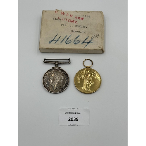 2039 - A boxed WWI British medal pair presented to 54804 PTE. J. Rowley. Devon. R.