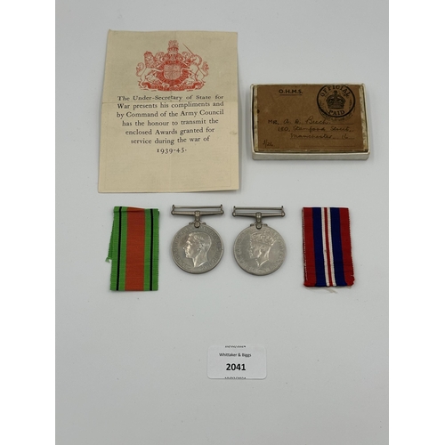 2041 - A boxed WWII medal pair, one 1939-1945 War and one 1939-1945 Defence