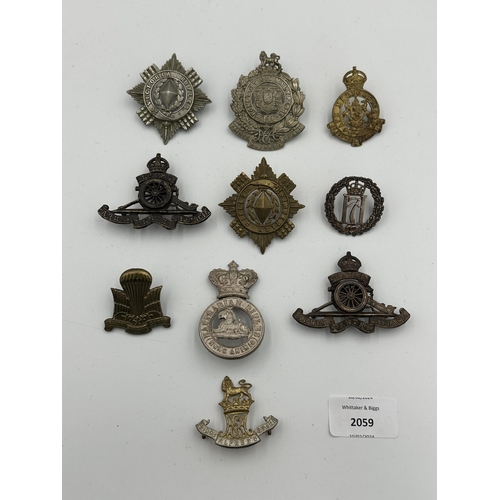 2059 - Ten military cap badges