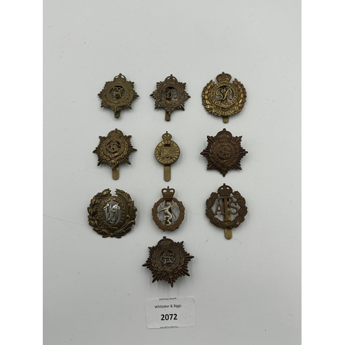 2072 - Ten military cap badges