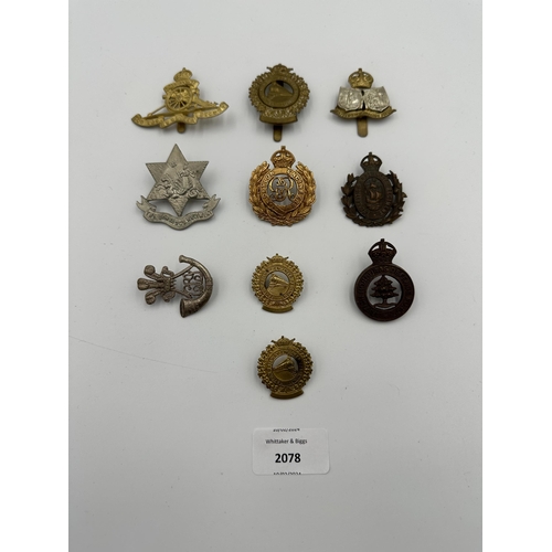 2078 - Ten military cap badges