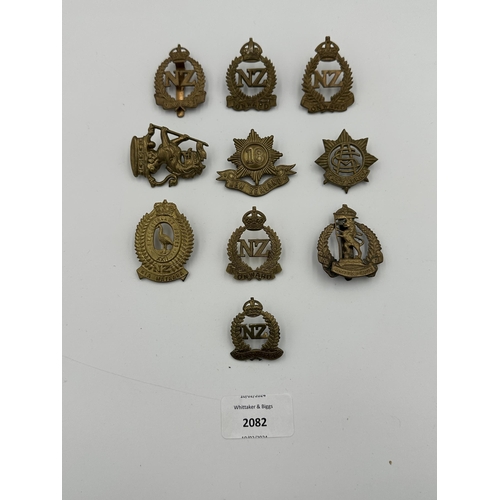 2082 - Ten military cap badges