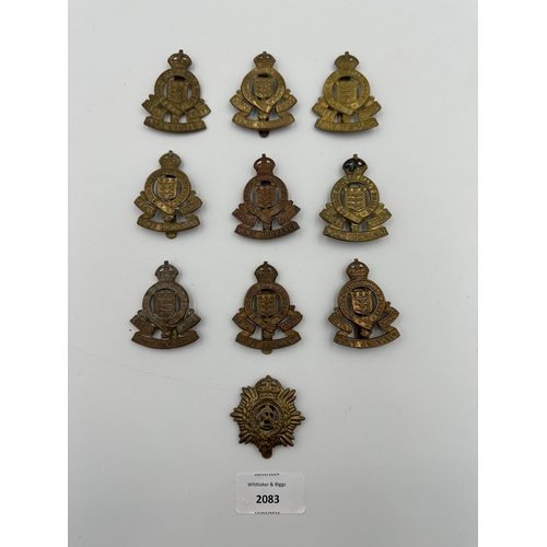 2083 - Ten military cap badges