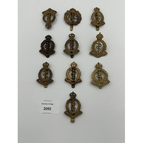 2092 - Ten military cap badges